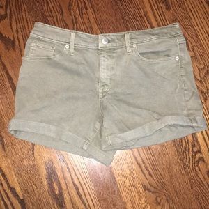 Green/olive jean shorts.
